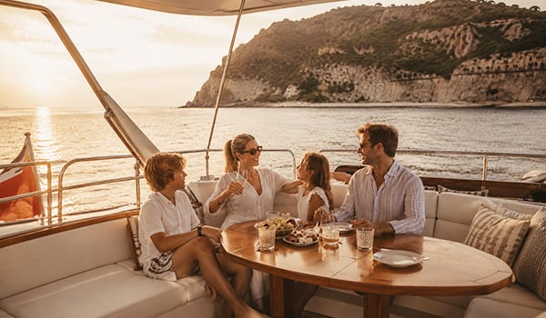 Family cruising aboard a luxury yacht in the Mediterranean